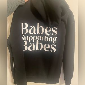 NWT - Brunette the Label - “Babes Supporting Babes” Big Sister Hoodie - Black